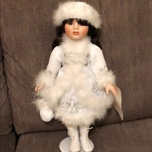 Musical porcelain doll